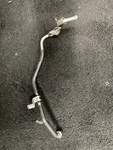 Genuine Ford Tube Assembly HL3E-9J323-CA. Fixed Price $23.00.