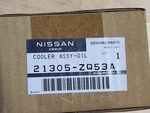 New Genuine Nissan Armada Titan Infiniti QX56 Engine Oil Cooler Oem 21305-ZQ53A. Fixed Price $375.00.